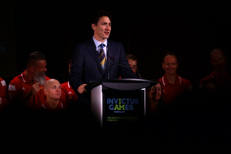 (FILES) This file photo taken on May 02, 2016 shows Canada's Prime Minister Justin Trudeau speaking following British Prince Harry's announcement that Canada will be hosting the 2017 Invictus games at the Fairmont Royal York Hotel in Toronto. Prime Minister Justin Trudeau said June 13, 2016 it was "likely" that a Canadian kidnapped by Islamic militants in the southern Philippines nearly nine months ago has been killed."It is with deep sadness that I have reason to believe that a Canadian citizen, Robert Hall, held hostage in the Philippines since September 21, 2015, has been killed by his captors," Trudeau said in a statement. / AFP PHOTO / Cole Burston