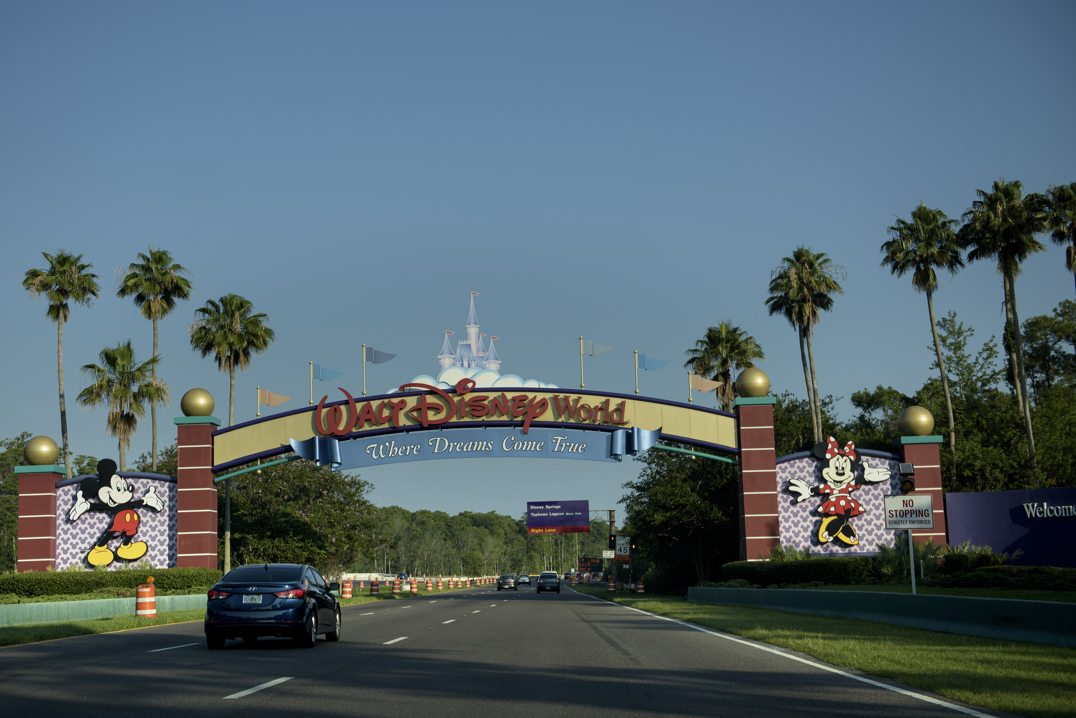 The entrance to the Walt Disney World theme park is seen June 15, 2016 in Orlando, Florida where a two-year-old boy was attacked by an alligator at the Seven Seas Lagoon by the Grand Floridian hotel. An American family's Disney vacation turned into a nightmare when an alligator snatched a two-year-old boy at the shore of a resort lake and fought off the father's frantic attempts to wrest the toddler from its mouth, officials said Wednesday. A search and rescue operation was launched after the attack Tuesday night at the Grand Floridian hotel not far from the Magic Kingdom was ongoing, but police said they held out little hope the boy would be found alive.  / AFP PHOTO / Brendan Smialowski