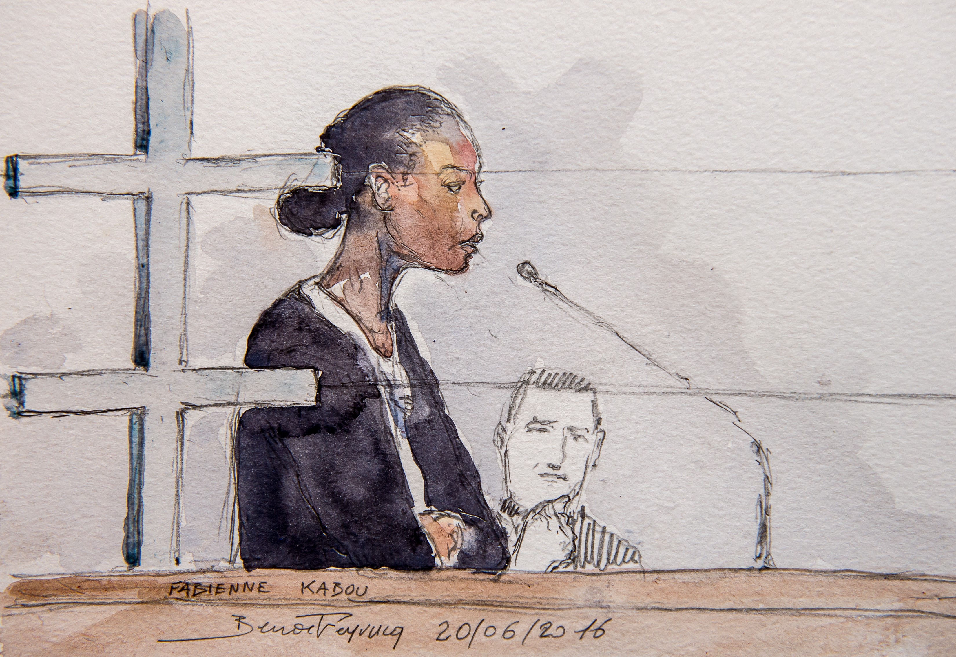 This court sketch made on June 20, 2016 shows Fabienne Kabou speaking during the first day of her trial in the Saint-Omer assize court's hearing room, in Saint-Omer. Fabienne Kabou faces trial from June 20 for having allegedly killed her 15-month-old daughter, Adelaide, by abandonning her on a beach in Berck-sur-Mer. / AFP PHOTO / BENOIT PEYRUCQ