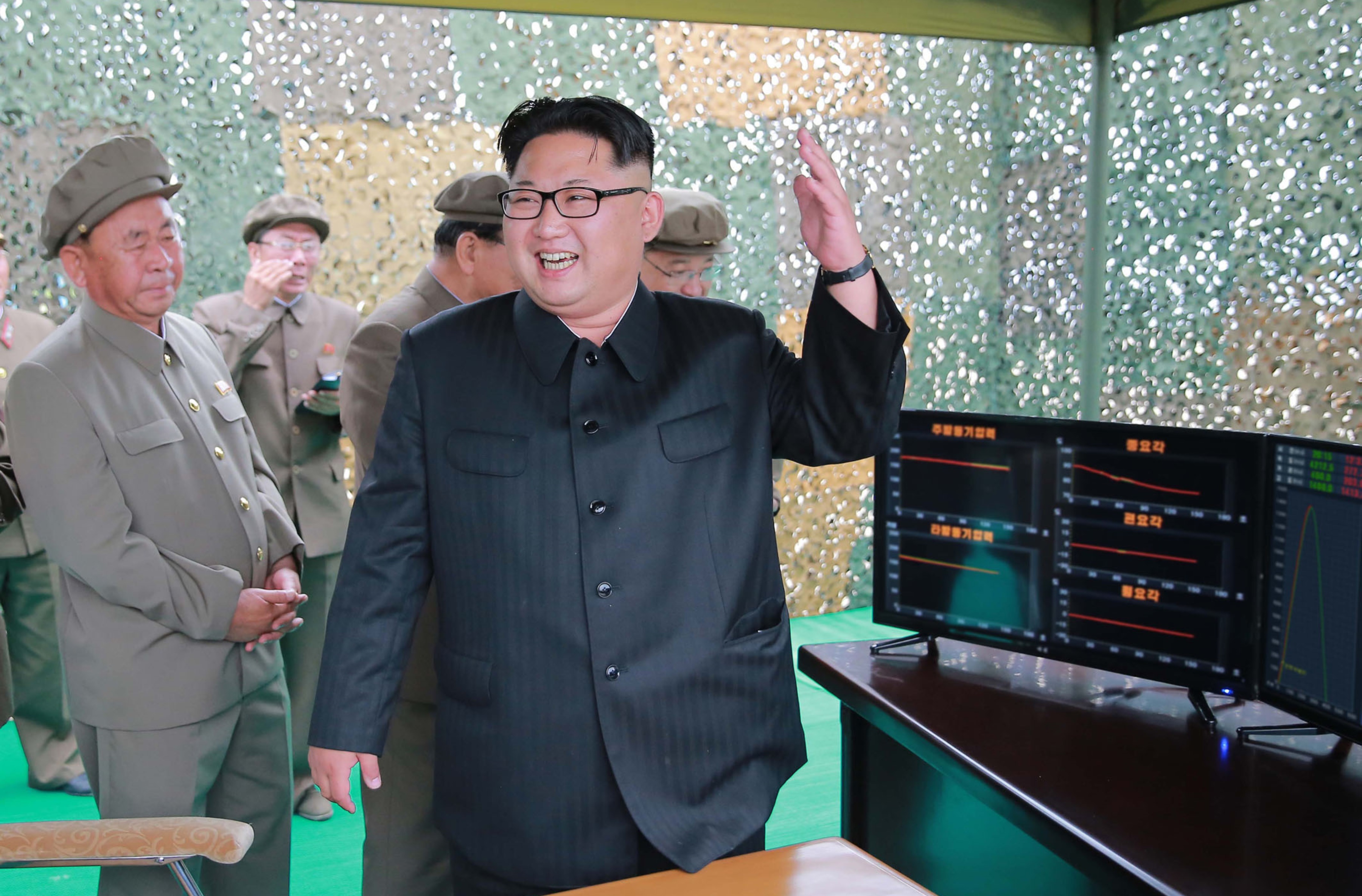 This undated picture released from North Korea's official Korean Central News Agency (KCNA) on June 23, 2016 shows North Korean leader Kim Jong-Un (C) inspecting a test of the surface-to-surface medium long-range strategic ballistic missile Hwasong-10 at an undisclosed location in North Korea. The Musudan -- also known as the Hwasong-10 -- has a theoretical range of anywhere between 2,500 and 4,000 kilometres (1,550 to 2,500 miles). / AFP PHOTO / KCNA VIA KNS / KCNA / South Korea OUT / REPUBLIC OF KOREA OUT   ---EDITORS NOTE--- RESTRICTED TO EDITORIAL USE - MANDATORY CREDIT "AFP PHOTO/KCNA VIA KNS" - NO MARKETING NO ADVERTISING CAMPAIGNS - DISTRIBUTED AS A SERVICE TO CLIENTS THIS PICTURE WAS MADE AVAILABLE BY A THIRD PARTY. AFP CAN NOT INDEPENDENTLY VERIFY THE AUTHENTICITY, LOCATION, DATE AND CONTENT OF THIS IMAGE. THIS PHOTO IS DISTRIBUTED EXACTLY AS RECEIVED BY AFP.  /