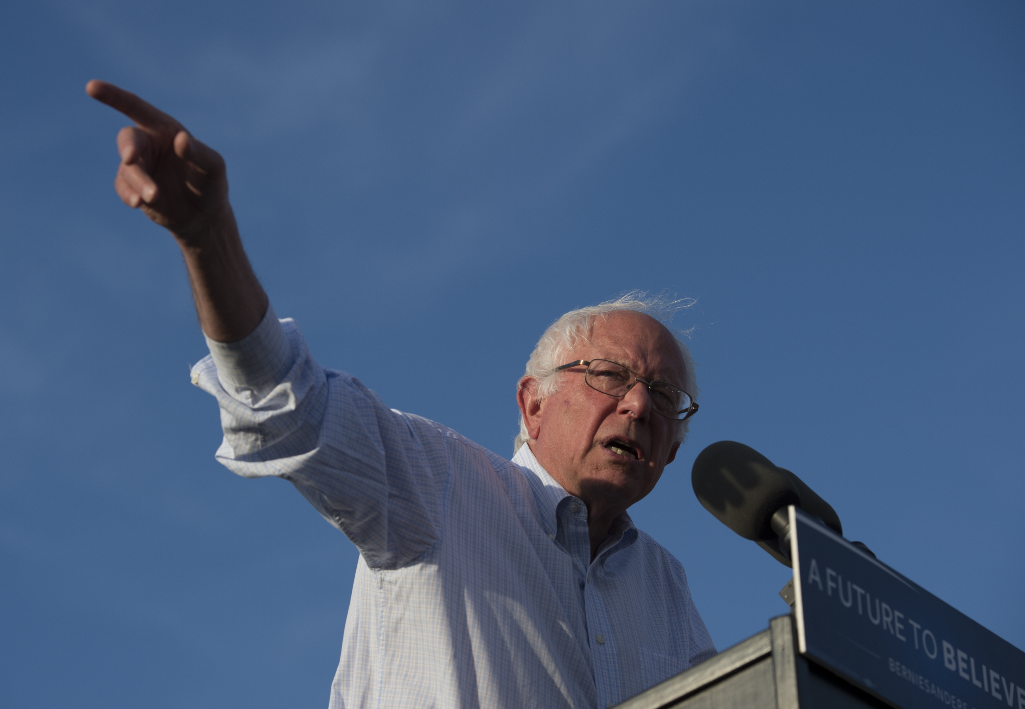 (FILES) This file photo taken on June 8, 2016 shows Democratic Presidential Candidate Bernie Sanders  during A Future to Believe In rally in Washington, DC.   Bernie Sanders said June 24, 2016 he will vote for Hillary Clinton in the US presidential election in November, bowing to his former rival for the White House but stopping short of a full endorsement.Asked on MSNBC whether he would cast his ballot for Clinton, the Vermont senator who waged a surprisingly tough campaign during the primaries said, "Yes."  / AFP PHOTO / MOLLY RILEY