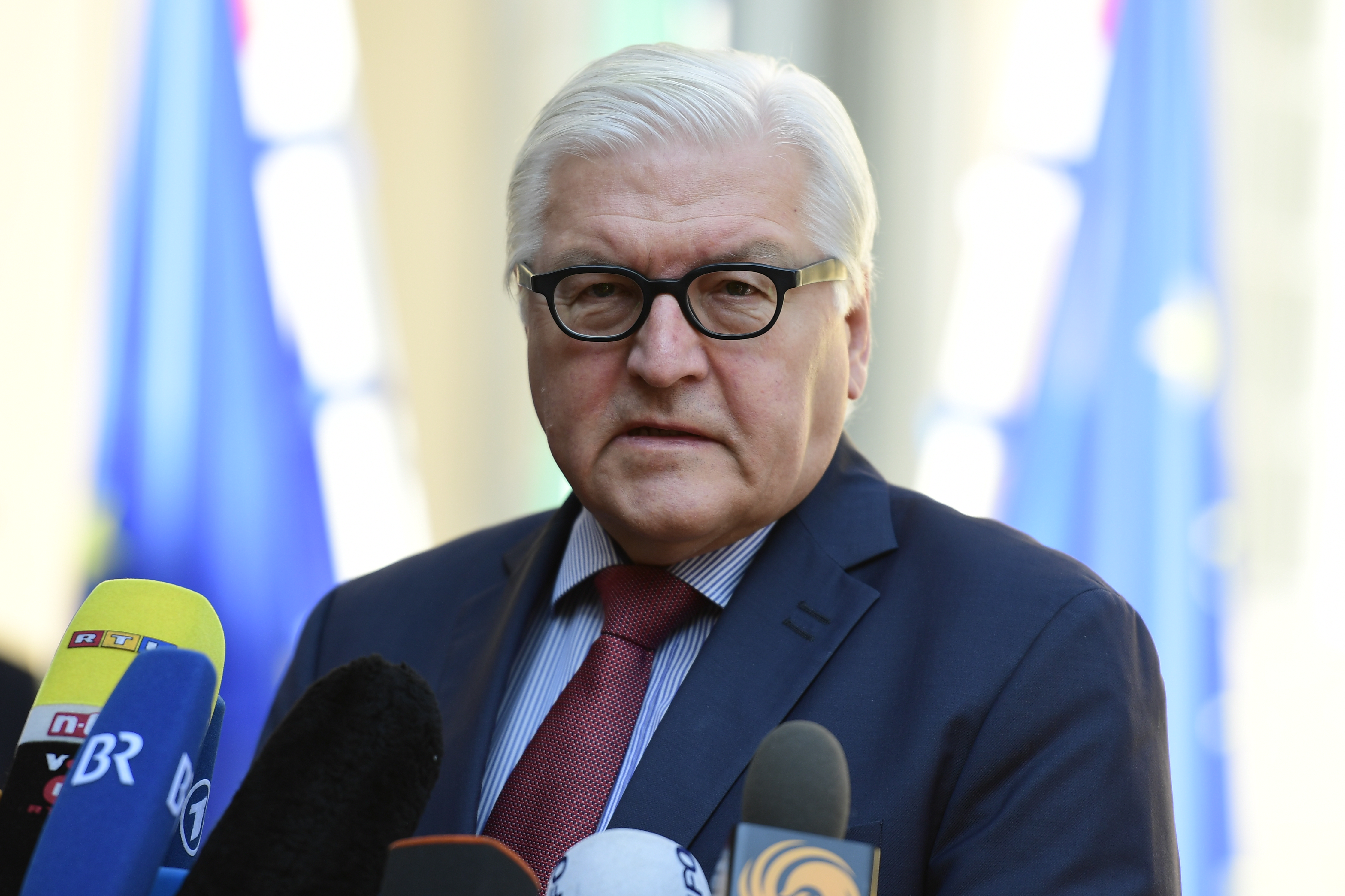 Germany's Foreign minister Frank-Walter Steinmeier addresses journalists before welcoming EU founding states' Foreign Ministers to hold post-Brexit talks at the Villa Borsig in Berlin on June 25, 2016. Foreign ministers of the six founding members of the European project meet to discuss the bloc's future in the wake of Britain's decision to leave.   / AFP PHOTO / John MACDOUGALL
