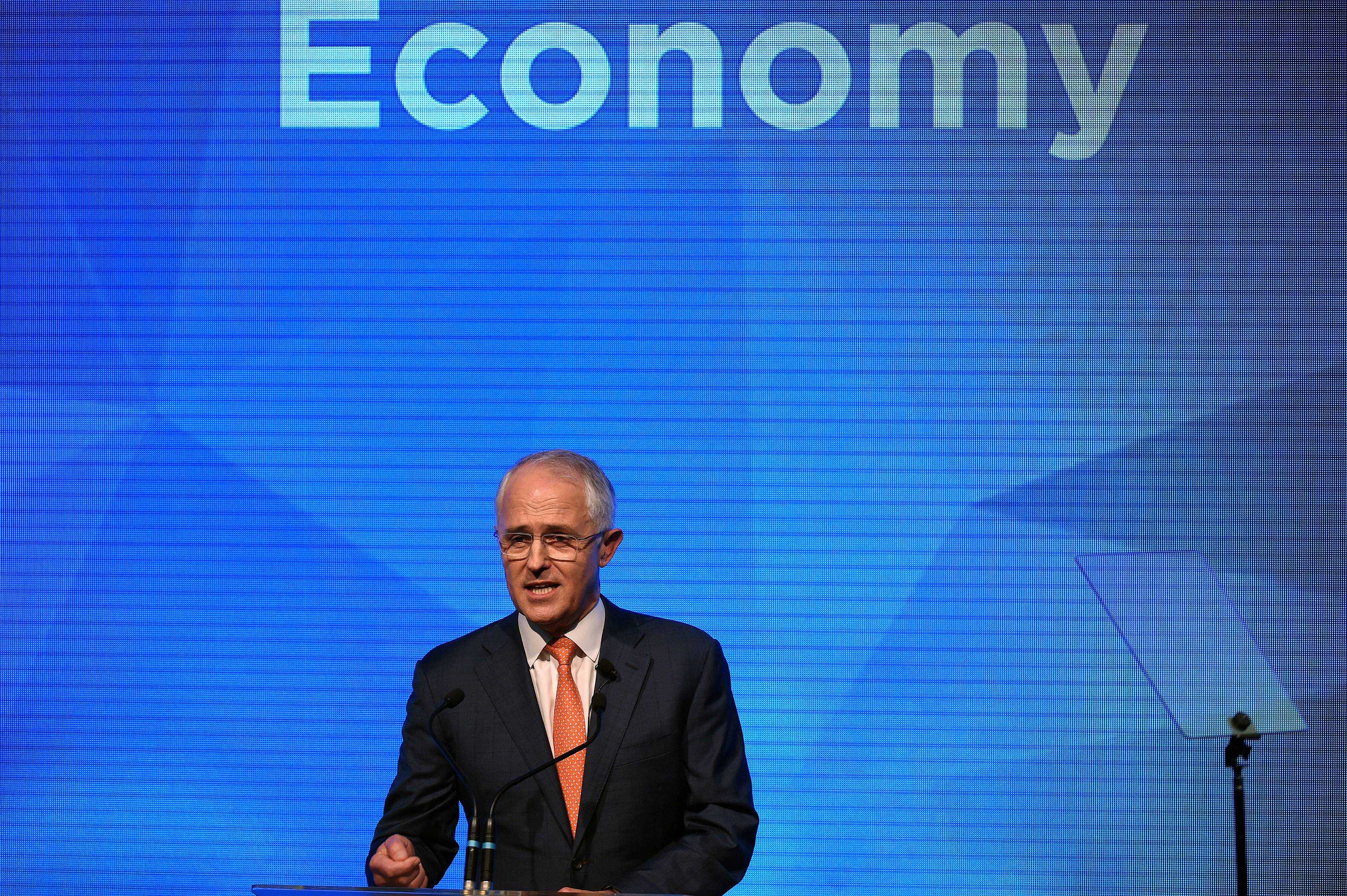 Australian Prime Minister Malcolm Turnbull addresses the Coalition Campaign launch in Sydney on June 26, 2016.  Turnbull used the chaos from Brexit to make a pitch for Australians to re-elect his coalition government, promising stability and strong economic leadership a week out from national polls to be held on July 2.  / AFP PHOTO / SAEED KHAN