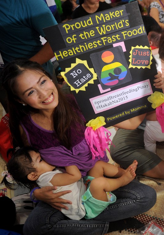 (AFP File photo) A mother breastfeeds her child in suburban Manila on August 1, 2015, to celebrate National Breastfeeding Awareness Month. The Philippines observes breastfeeding awareness month in August every year to boost awareness of the health and economic benefits and a goal to create a breastfeeding nation. AFP PHOTO / Jay DIRECTO / AFP PHOTO / JAY DIRECTO
