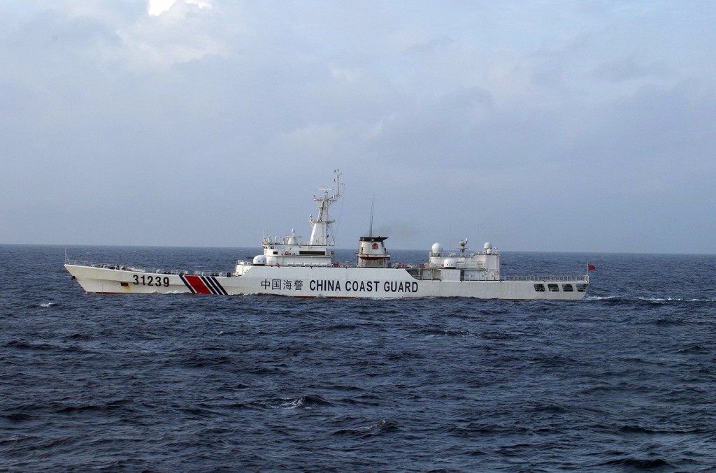 This handout picture taken and released by the Japan Coast Guard on December 22, 2015 shows a Chinese Coast Guard ship near disputed islets, known as the Senkaku islands in Japan and Diaoyu islands in China, in the East China Sea. Japan said December 22 it had spotted for the first time a Chinese coast guard ship armed with cannon-like equipment near disputed East China Sea islands. AFP PHOTO / JAPAN COAST GUARD ---EDITORS NOTE---HANDOUT RESTRICTED TO EDITORIAL USE - MANDATORY CREDIT "AFP PHOTO / JAPAN COAST GUARD" - NO MARKETING NO ADVERTISING CAMPAIGNS - DISTRIBUTED AS A SERVICE TO CLIENTS / AFP PHOTO / JAPAN COAST GUARD / JAPAN COAST GUARD
