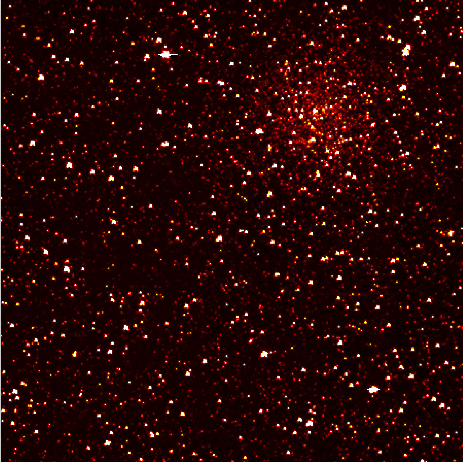 This image taken by the Kepler telescope and released by NASA on April 16, 2009, shows small portion of Kepler's full field of view -- an expansive, 100-square-degree patch of sky in our Milky Way galaxy. An eight-billion-year-old cluster of stars 13,000 light-years from Earth, called NGC 6791, can be seen in the image. Clusters are families of stars that form together out of the same gas cloud. This particular cluster is called an open cluster, because the stars are loosely bound and have started to spread out from each other. Launched in March, Kepler will spend 3 1/2 years studying these stars in search of small, rocky planets. AFP PHOTO/HO/NASA  / AFP PHOTO / NASA / HO