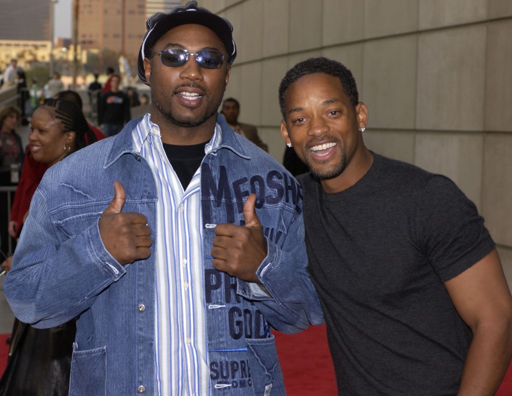 LOS ANGELES - FEBRUARY 15: (L-R) Boxer Lennox Lewis and actor Will Smith attend the 2004 NBA All-Star Game held at the Staples Center, February 15, 2004 in Los Angeles, California. (Photo by Vince Bucci/Getty Images) *** Local Caption *** Lennox Lewis;Will Smith