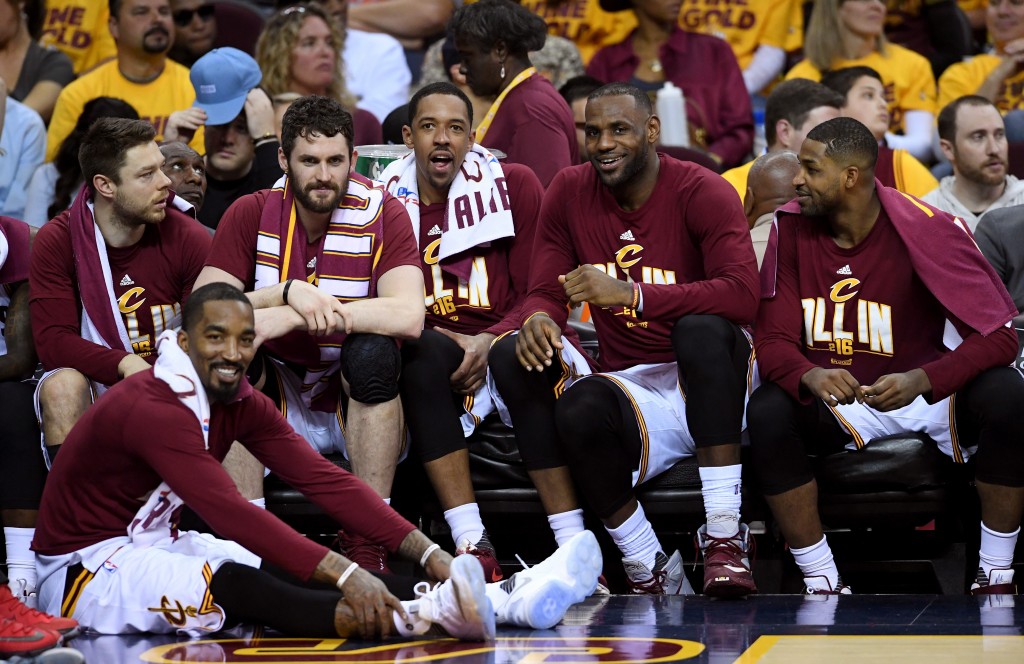 CLEVELAND, OH - MAY 25: J.R. Smith #5, Matthew Dellavedova #8, Kevin Love #0, Channing Frye #9, LeBron James #23 and Tristan Thompson #13 of the Cleveland Cavaliers look on from the bench late in the game against the Toronto Raptors in game five of the Eastern Conference Finals during the 2016 NBA Playoffs at Quicken Loans Arena on May 25, 2016 in Cleveland, Ohio. NOTE TO USER: User expressly acknowledges and agrees that, by downloading and or using this photograph, User is consenting to the terms and conditions of the Getty Images License Agreement. Jason Miller/Getty Images/AFP