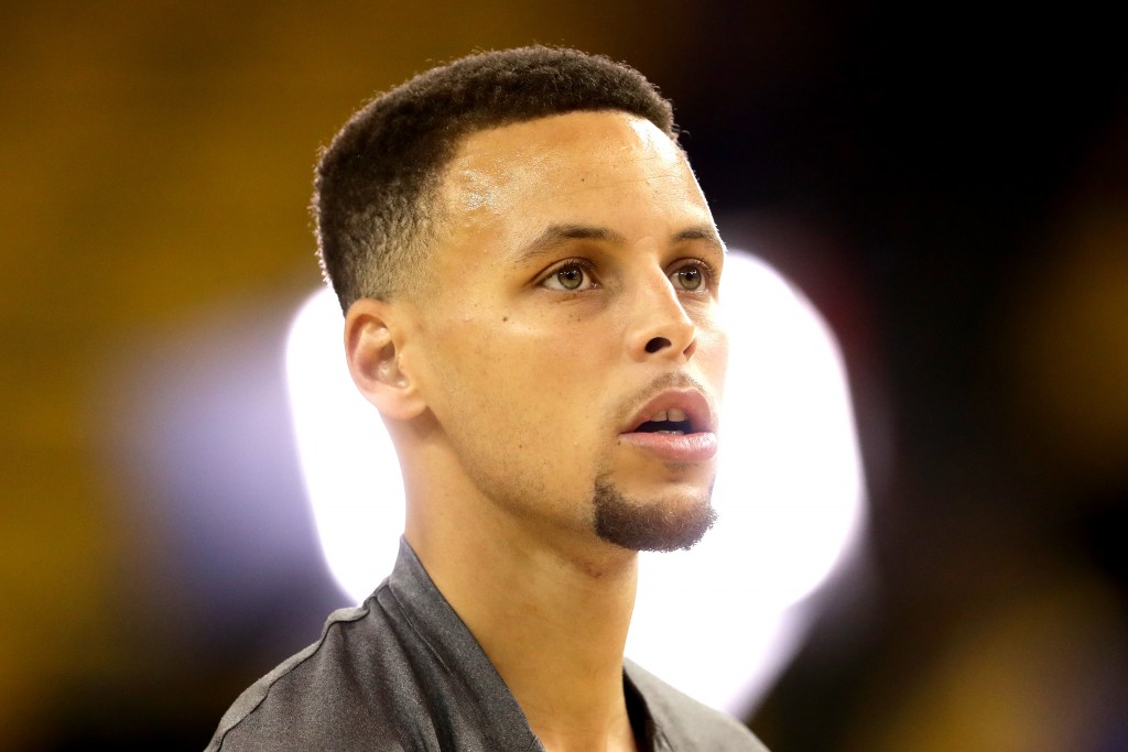 OAKLAND, CA - JUNE 02: Stephen Curry #30 of the Golden State Warriors shoots around before Game 1 of the 2016 NBA Finals against the Cleveland Cavaliers at ORACLE Arena on June 2, 2016 in Oakland, California. NOTE TO USER: User expressly acknowledges and agrees that, by downloading and or using this photograph, User is consenting to the terms and conditions of the Getty Images License Agreement. Ezra Shaw/Getty Images/AFP
