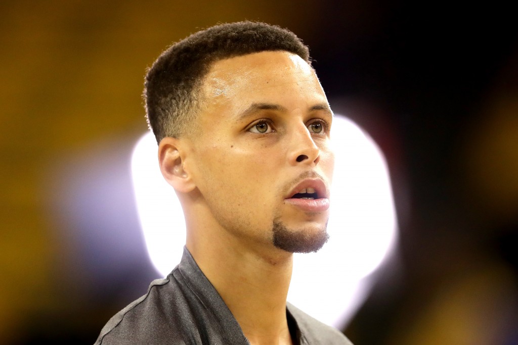 OAKLAND, CA - JUNE 02: Stephen Curry #30 of the Golden State Warriors shoots around before Game 1 of the 2016 NBA Finals against the Cleveland Cavaliers at ORACLE Arena on June 2, 2016 in Oakland, California. NOTE TO USER: User expressly acknowledges and agrees that, by downloading and or using this photograph, User is consenting to the terms and conditions of the Getty Images License Agreement.   Ezra Shaw/Getty Images/AFP