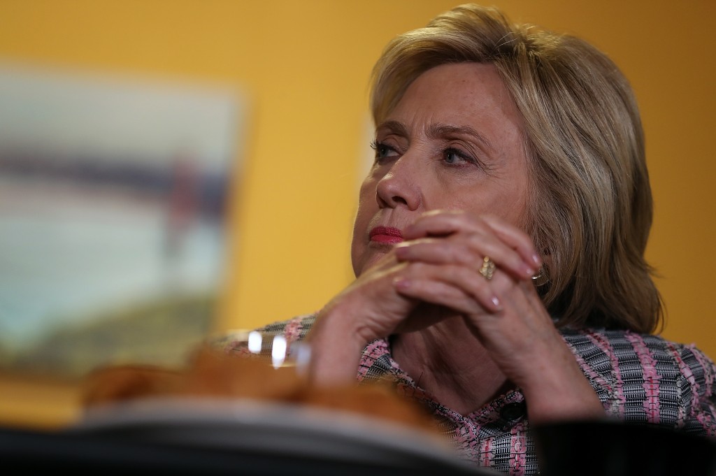 VALLEJO, CA - JUNE 05: Democratic presidential candidate, former Secretary of State Hillary Clinton looks on during a conversation with community leaders on June 5, 2016 in Vallejo, California. The California primary is June 7. Justin Sullivan/Getty Images/AFP
