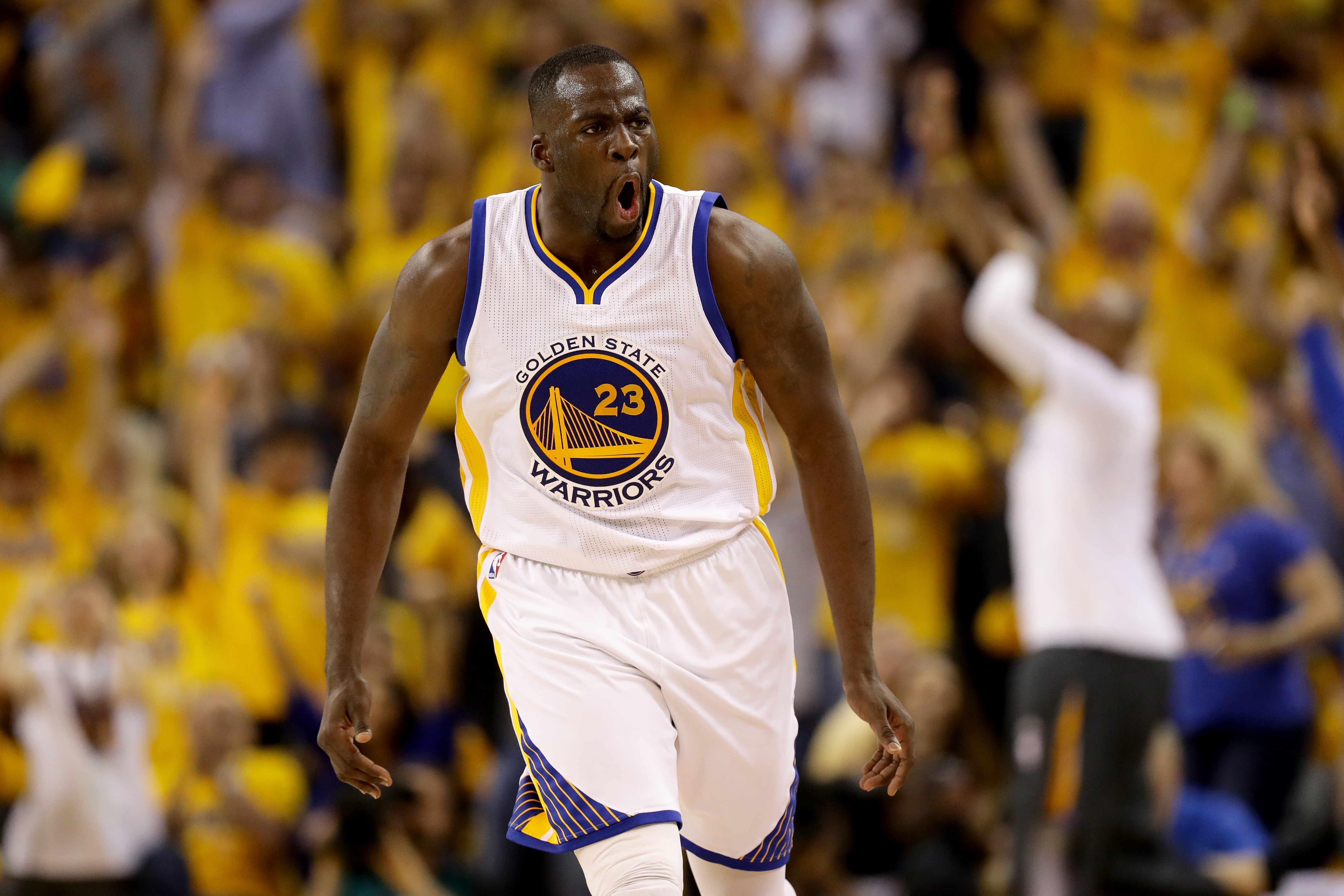 OAKLAND, CA - JUNE 05: Draymond Green #23 of the Golden State Warriors reacts in the second quarter of Game 2 of the 2016 NBA Finals against the Cleveland Cavaliers at ORACLE Arena on June 5, 2016 in Oakland, California. NOTE TO USER: User expressly acknowledges and agrees that, by downloading and or using this photograph, User is consenting to the terms and conditions of the Getty Images License Agreement.   Ezra Shaw/Getty Images/AFP