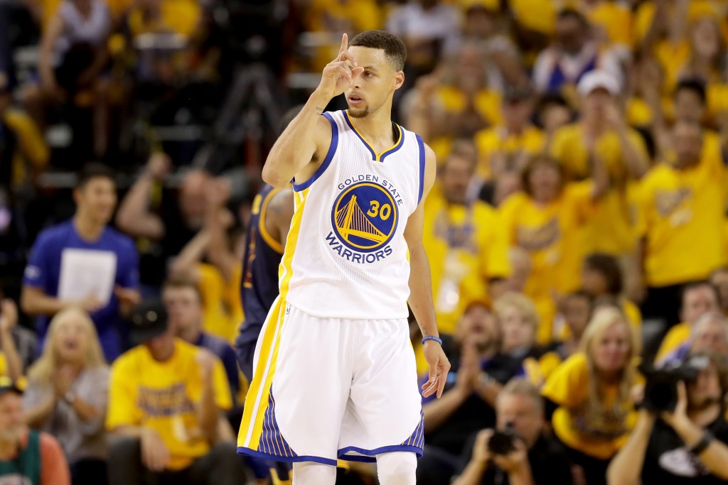 OAKLAND, CA - JUNE 05: Stephen Curry #30 of the Golden State Warriors reacts in the second quarter of Game 2 of the 2016 NBA Finals against the Cleveland Cavaliers at ORACLE Arena on June 5, 2016 in Oakland, California. NOTE TO USER: User expressly acknowledges and agrees that, by downloading and or using this photograph, User is consenting to the terms and conditions of the Getty Images License Agreement. Ezra Shaw/Getty Images/AFP
