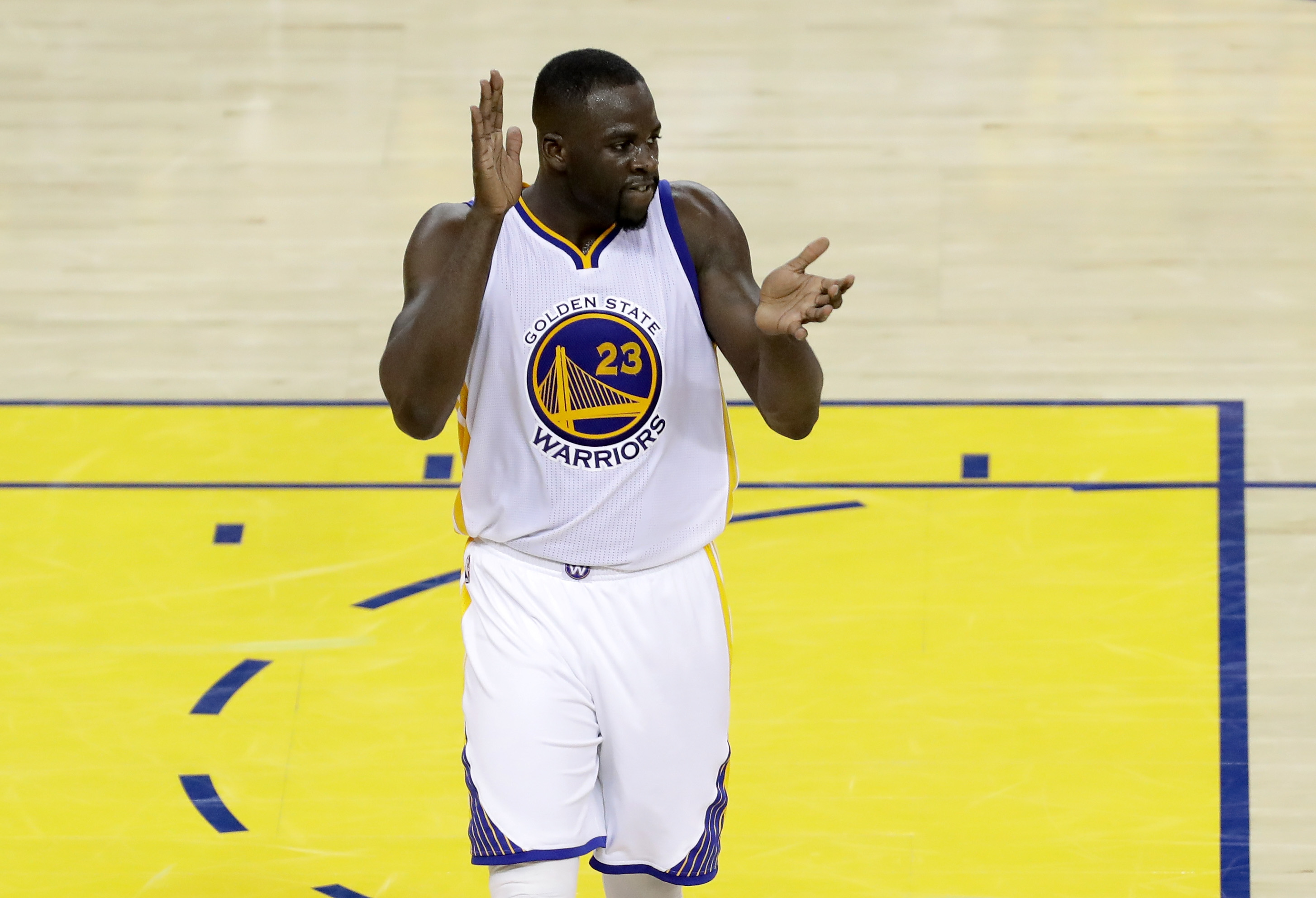OAKLAND, CA - JUNE 05: Draymond Green #23 of the Golden State Warriors reacts during Game 2 of the 2016 NBA Finals against the Cleveland Cavaliers at ORACLE Arena on June 5, 2016 in Oakland, California. NOTE TO USER: User expressly acknowledges and agrees that, by downloading and or using this photograph, User is consenting to the terms and conditions of the Getty Images License Agreement.   Ronald Martinez/Getty Images/AFP