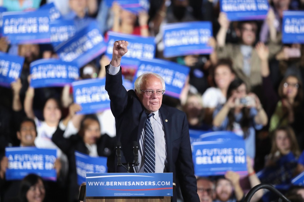 SANTA MONICA, CA - JUNE 07: Democratic presidential candidate Senator Bernie Sanders (D-VT) greets supporters at an election-night rally on June 7, 2016 in Santa Monica, ia. Hillary Clinton held an early lead in today's California primary. Scott Olson/Getty Images/AFP