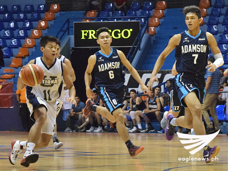 SAN JUAN, Philippines – National University guard Cedric Labing-isa drives past the defense of Adamson forwards James Pasturan and Frederick Tungcab in their Filoil Flying V Hanes Pre-season Premier Cup quarterfinals game on Tuesday. (Photo: Ariane Joy Sabale / Sports On Air, Eagle News Service)