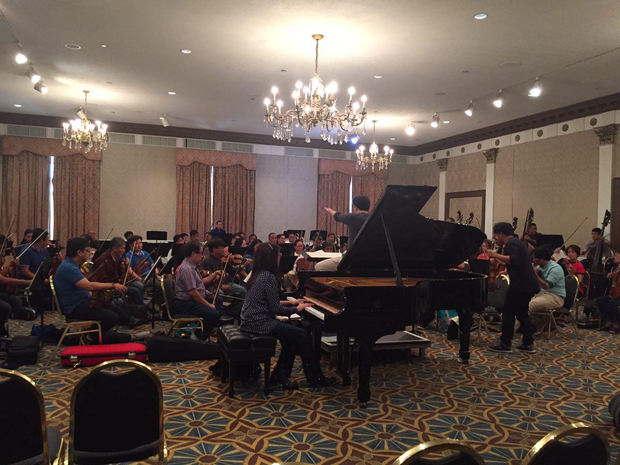 Members of the Philippine Philharmonic Orchestra prepare for their historic debut performance at Carnegie Hall in New York.