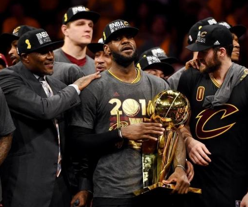 Jun 19, 2016; Oakland, CA, USA; Cleveland Cavaliers forward LeBron James (23) celebrates with the Larry O'Brien Championship Trophy after beating the Golden State Warriors in game seven of the NBA Finals at Oracle Arena. Mandatory Credit: Bob Donnan-USA TODAY Sports