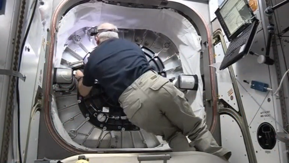 Astronauts aboard the International Space Station float inside an experimental inflatable module that NASA says will test a less expensive and potentially safer option for housing crews during long stays in space.(photo grabbed from Reuters video)