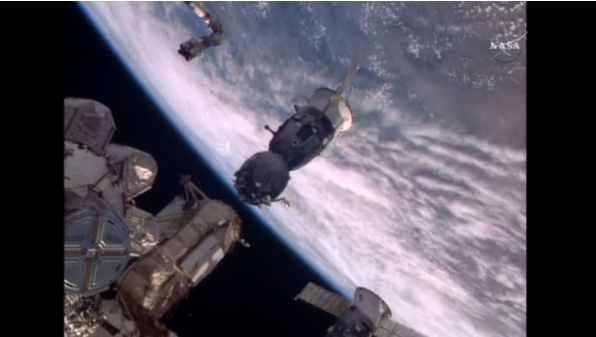 A Soyuz TMA-19M capsule undocks from the International Space Station (ISS), beginning the descent that will bring one cosmonaut and two astronauts back to earth.(photo grabbed from Reuters video) 
