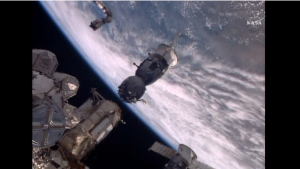 A Soyuz TMA-19M capsule undocks from the International Space Station (ISS), beginning the descent that will bring one cosmonaut and two astronauts back to earth.(photo grabbed from Reuters video)