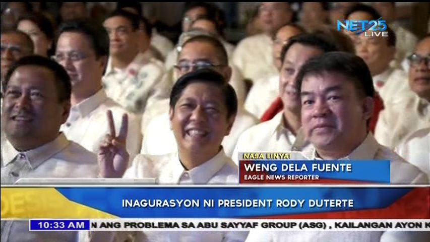 Senator Ferdinand "Bongbong" Marcos Jr., is all smiles during the inauguration of President Rodrigo Duterte.  (screengrab Eagle News Service)
