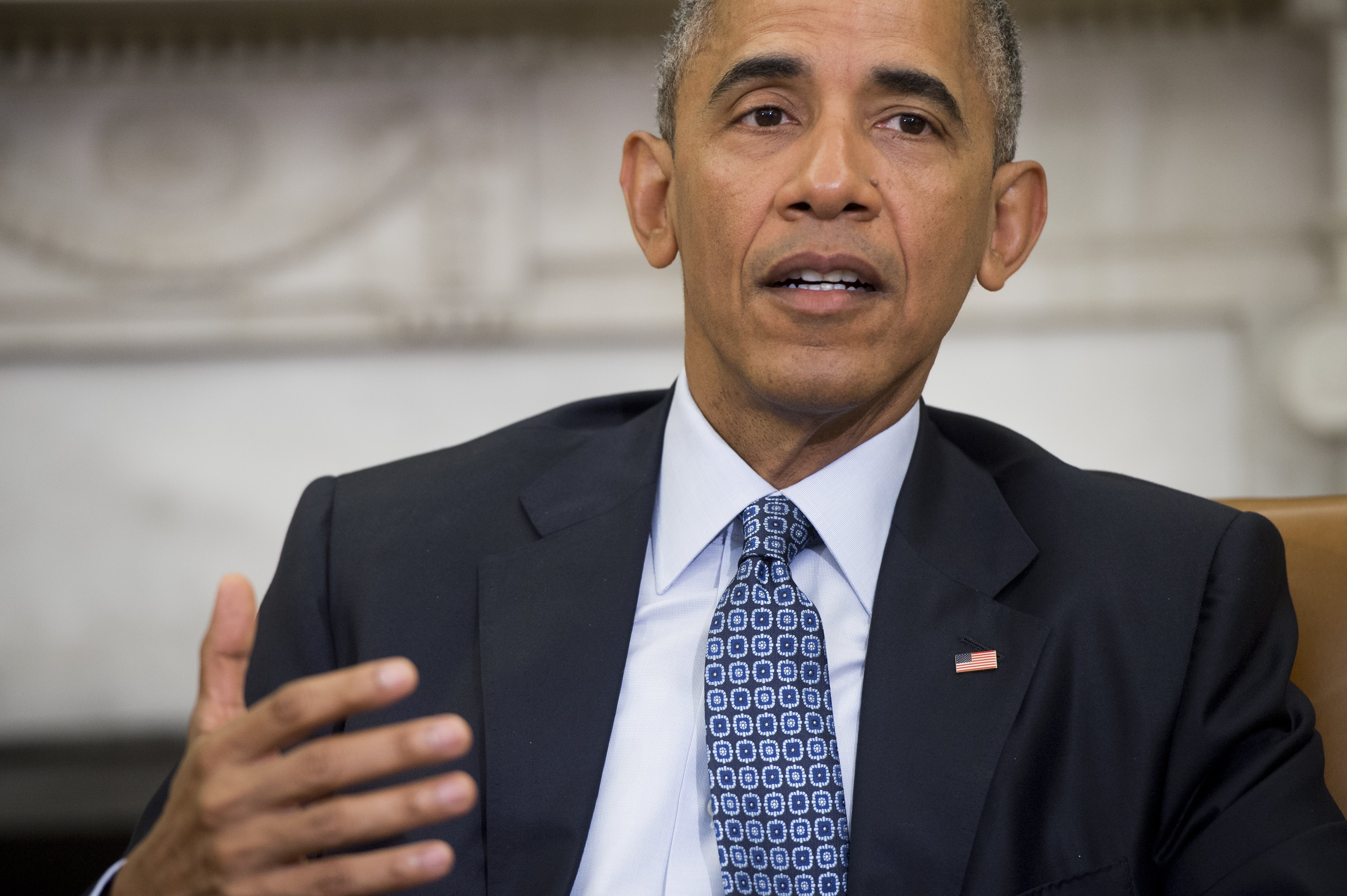 US President Barack Obama speaks about the response and precautions to take for the Zika virus, during a meeting in the Oval Office of the White House in Washington, DC, July 1, 2016. / AFP PHOTO / SAUL LOEB