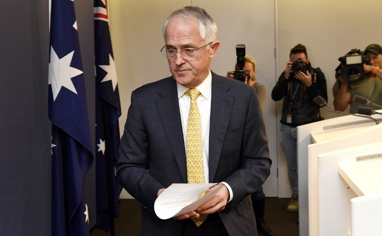 Australia's Prime Minister Malcolm Turnbull leaves a press conference in Sydney on July 3, 2016, a day after the country's general election was held. Australia was in political limbo after voters failed to hand Prime Minister Malcolm Turnbull the stability he craved in calling an election, with the nation instead facing the prospect of a hung parliament. / AFP PHOTO / WILLIAM WEST