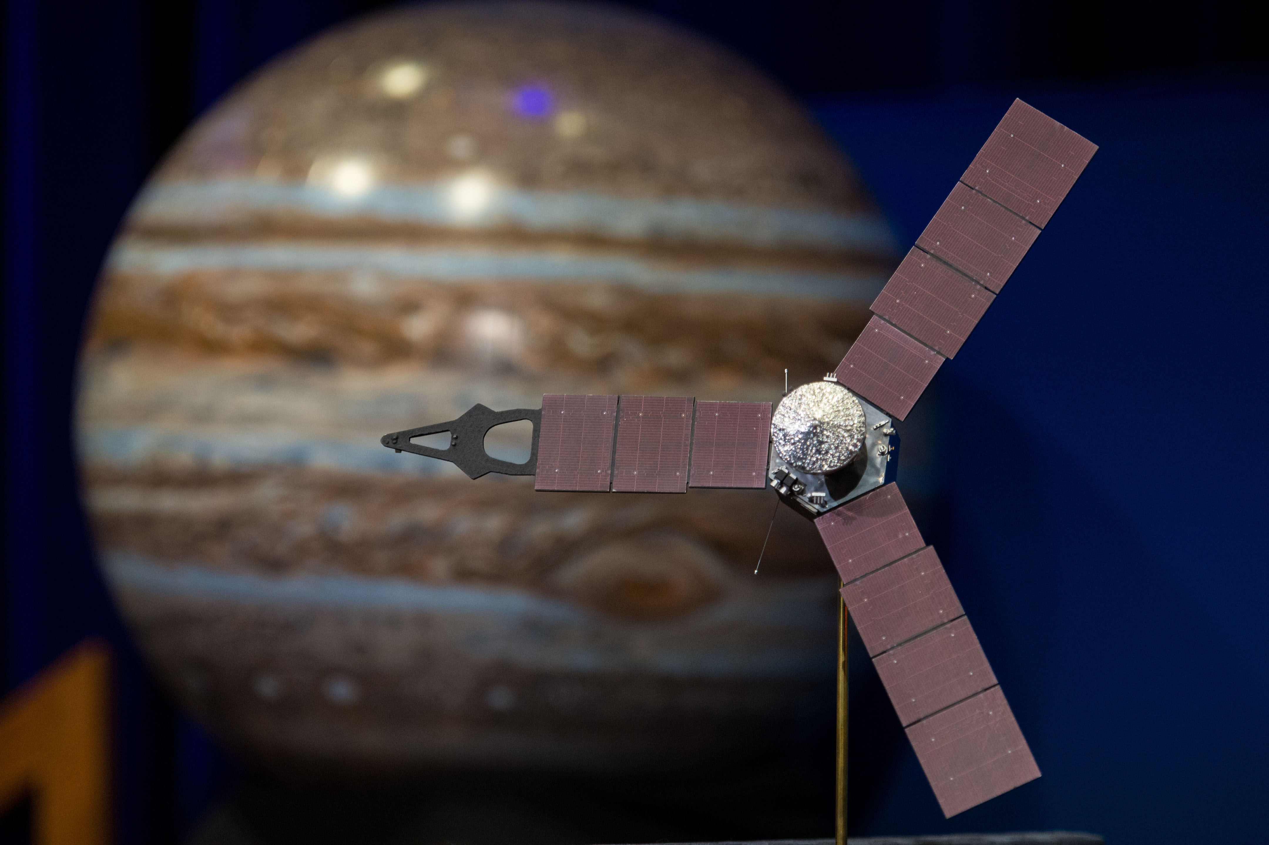 This NASA photo obtained July 4, 2016 shows a model of the Juno spacecraft at a news briefing, held before Juno enters orbit around Jupiter, on June 30, 2016 at the Jet Propulsion Laboratory (JPL) in Pasadena, CA.  The Juno mission launched August 5, 2011 and will arrive at Jupiter July 4, 2016 to orbit the planet for 20 months and collect data on the planetary core, map the magnetic field, and measure the amount of water and ammonia in the atmosphere. / AFP PHOTO / (NASA/Aubrey Gemignani) / NASA/Aubrey GEMIGNANI / RESTRICTED TO EDITORIAL USE - MANDATORY CREDIT "AFP PHOTO / NASA/AUBREY GEMIGNANI" - NO MARKETING NO ADVERTISING CAMPAIGNS - DISTRIBUTED AS A SERVICE TO CLIENTS