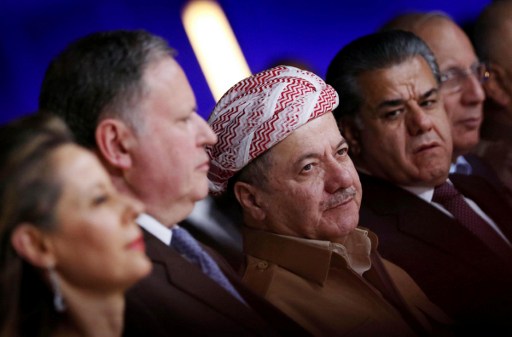 French Consul General in Arbil Alain Guepratte (L) and Massud Barzani (C), president of Iraq's regional Kurdish government, attend celebrations for Bastille Day, on July 14, 2016 in Arbil, the capital of Iraq's northern autonomous Kurdish region A gunman smashed a truck into a crowd of revellers celebrating Bastille Day in the French Riviera city of Nice, killing at least 84 people in what President Francois Hollande on Friday called a "terrorist" attack. / AFP PHOTO / SAFIN HAMED