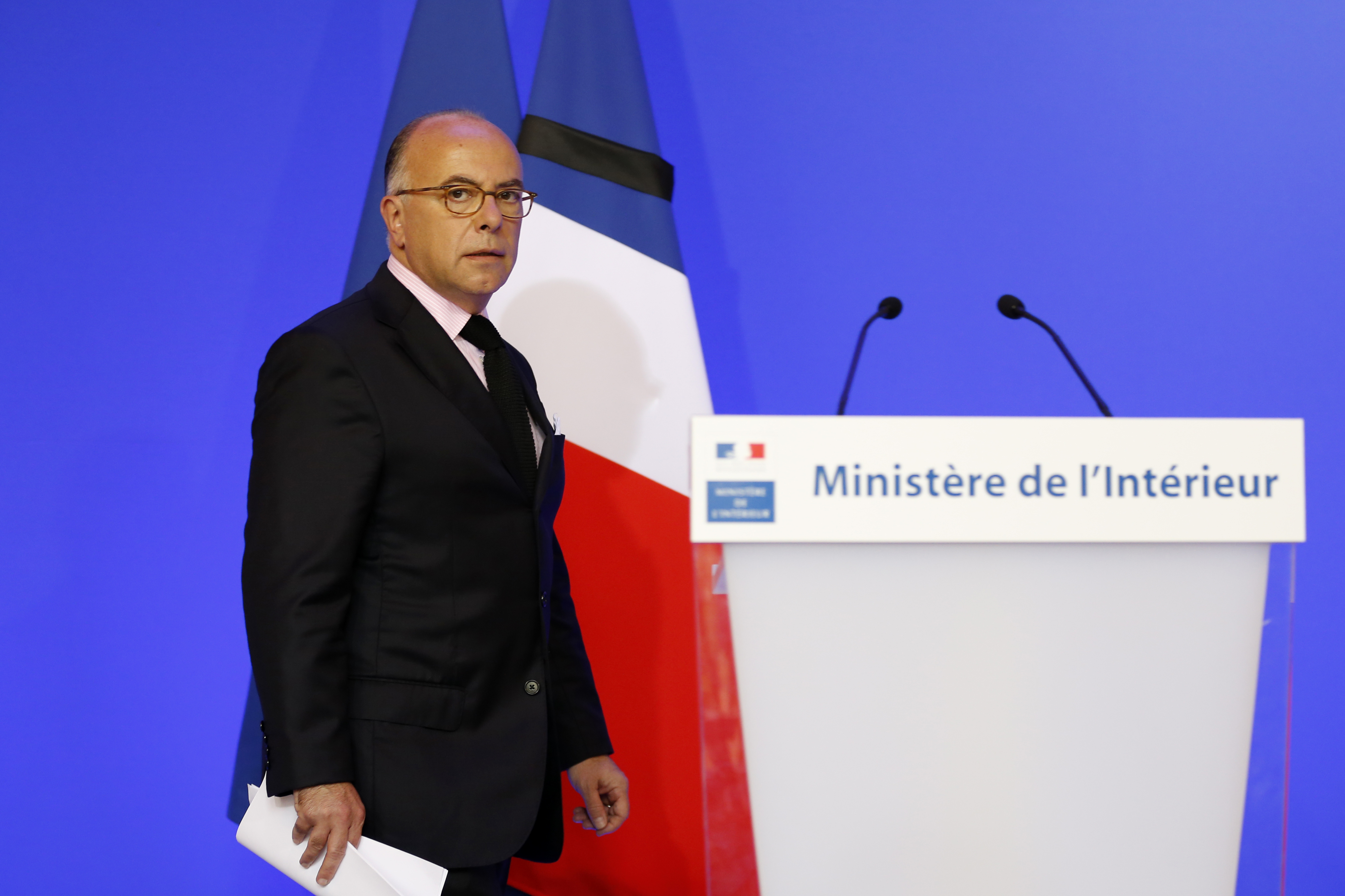 French Interior Minister Bernard Cazeneuve arrives to deliver a statement at Hotel de Beauvau in Paris on July 16, 2016, following the Bastille Day attack in Nice. French Interior Minister Bernard Cazeneuve on July 16 called "all patriotic citizens who wish to do so" to become reservists to boost security after the latest terror attack. The Islamic State group claimed responsibility for the truck attack that killed 84 people in Nice on France's national holiday, a news service affiliated with the jihadists said on July 16. / AFP PHOTO / MATTHIEU ALEXANDRE