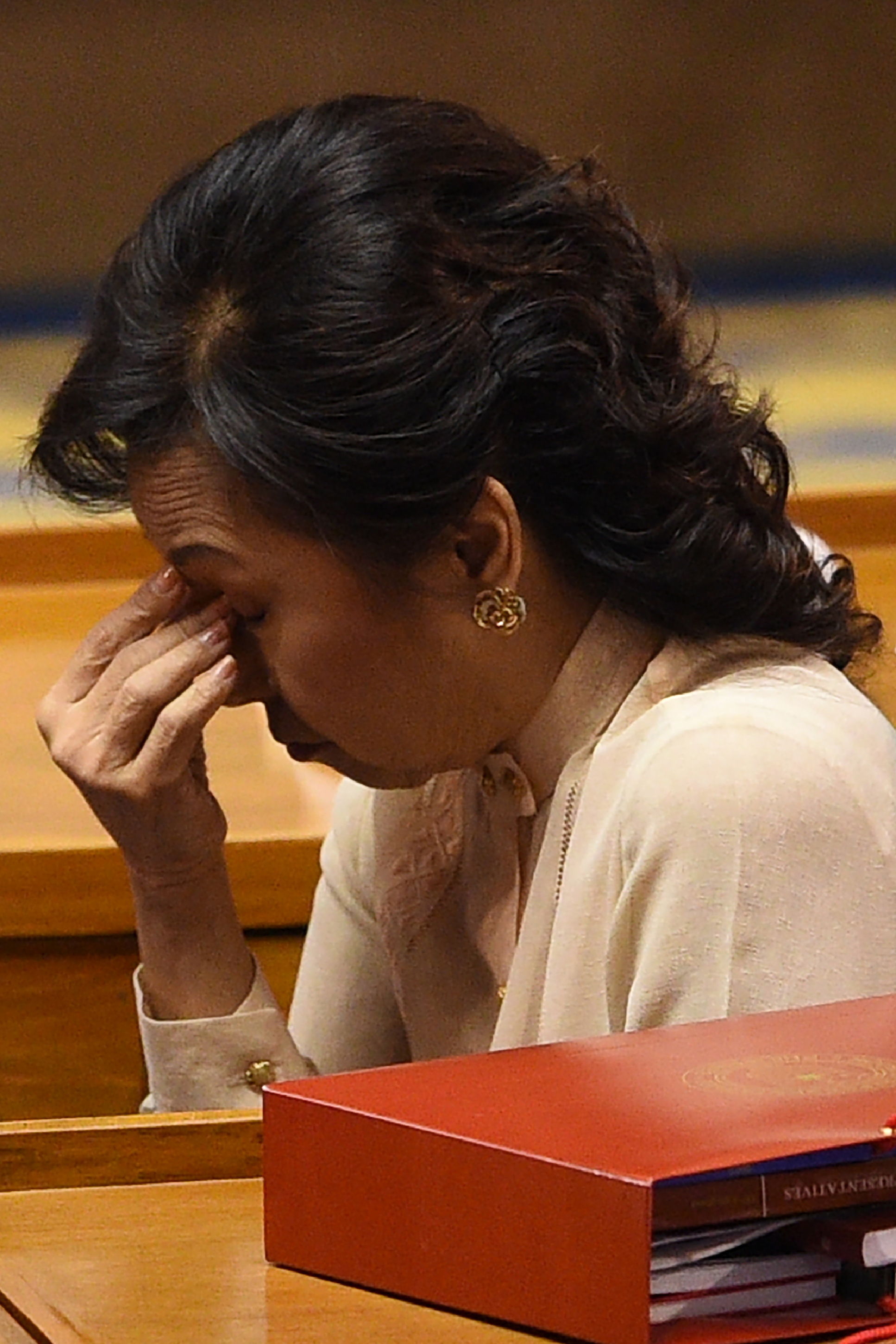 Former Philippine president and now congresswoman Gloria Arroyo attends the legislature session and State of the Nation Address at the congress in Manila on July 25, 2016.  Former president Arroyo said she was a victim of political persecution after she was freed from nearly five years in detention for a corruption case, media reports said July 25. / AFP PHOTO / TED ALJIBE