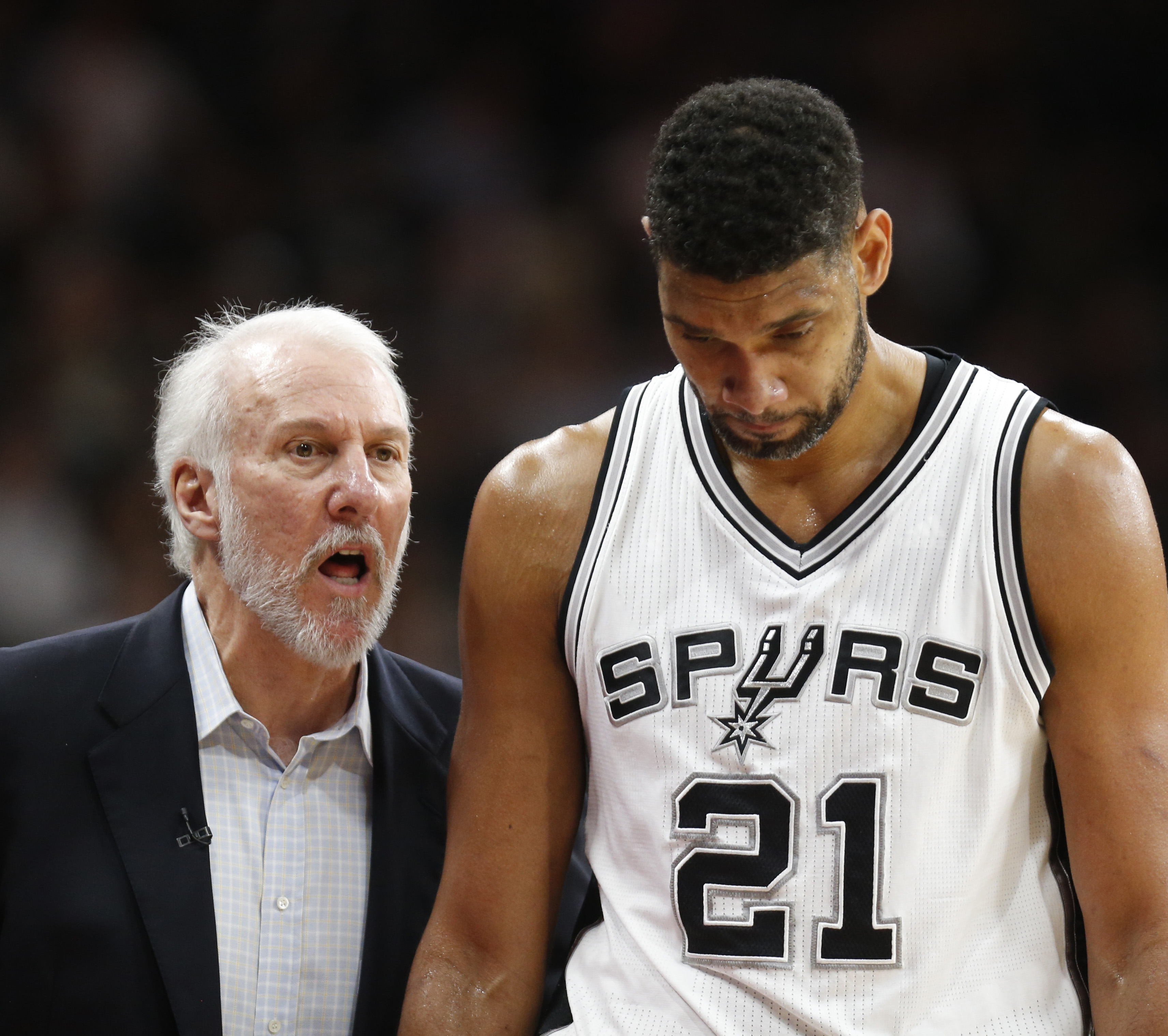 SAN ANTONIO,TX - APRIL 12: San Antonio head coach Gregg Popovic talks with Tim Duncan #21 of the San Antonio Spurs as he comes out against the Oklahoma City Thunder at AT&T Center on April 12, 2016 in San Antonio, Texas. NOTE TO USER: User expressly acknowledges and agrees that , by downloading and or using this photograph, User is consenting to the terms and conditions of the Getty Images License Agreement.   Ronald Cortes/Getty Images/AFP
