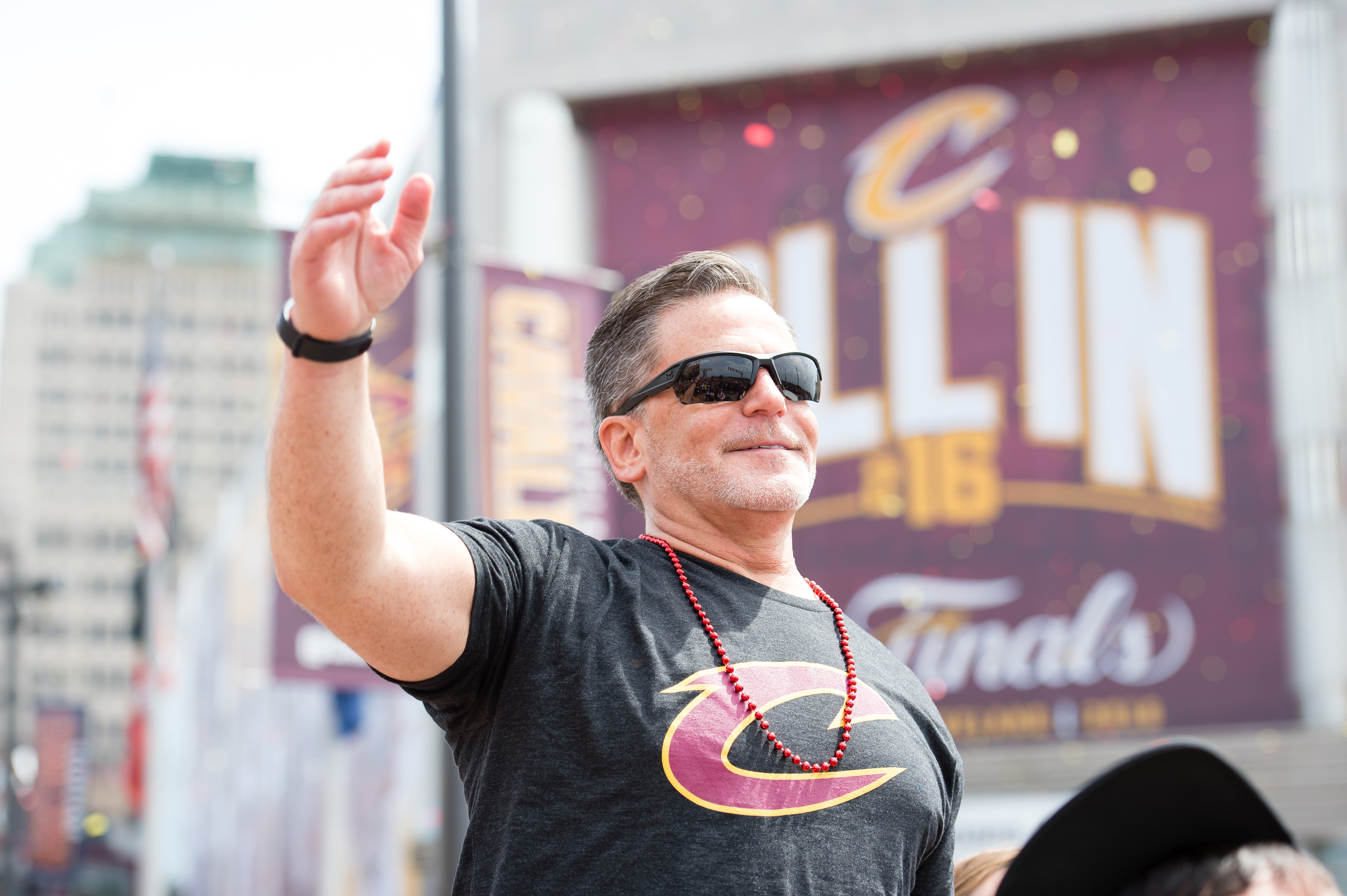 CLEVELAND, OH - JUNE 22: Majority owner of the Cleveland Cavaliers Dan Gilbert waves to the fans during the Cleveland Cavaliers 2016 championship victory parade and rally on June 22, 2016 in Cleveland, Ohio. NOTE TO USER: User expressly acknowledges and agrees that, by downloading and/or using this photograph, user is consenting to the terms and conditions of the Getty Images License Agreement.   Jason Miller/Getty Images/AFP