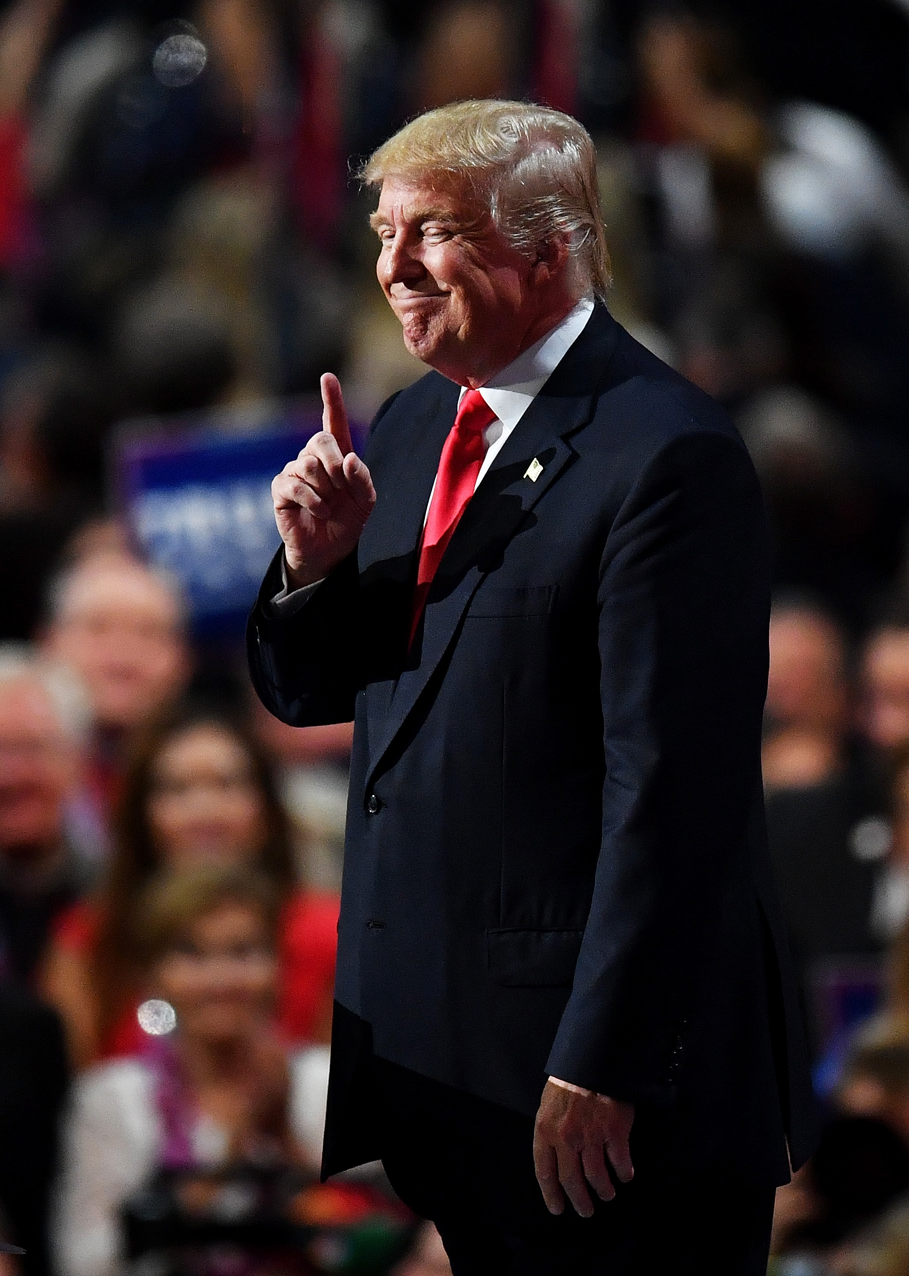 CLEVELAND, OH - JULY 21: Republican presidential candidate Donald Trump gestures to the crowd during his speech in the evening session on the fourth day of the Republican National Convention on July 21, 2016 at the Quicken Loans Arena in Cleveland, Ohio. Republican presidential candidate Donald Trump received the number of votes needed to secure the party's nomination. An estimated 50,000 people are expected in Cleveland, including hundreds of protesters and members of the media. The four-day Republican National Convention kicked off on July 18.   Jeff J Mitchell/Getty Images/AFP