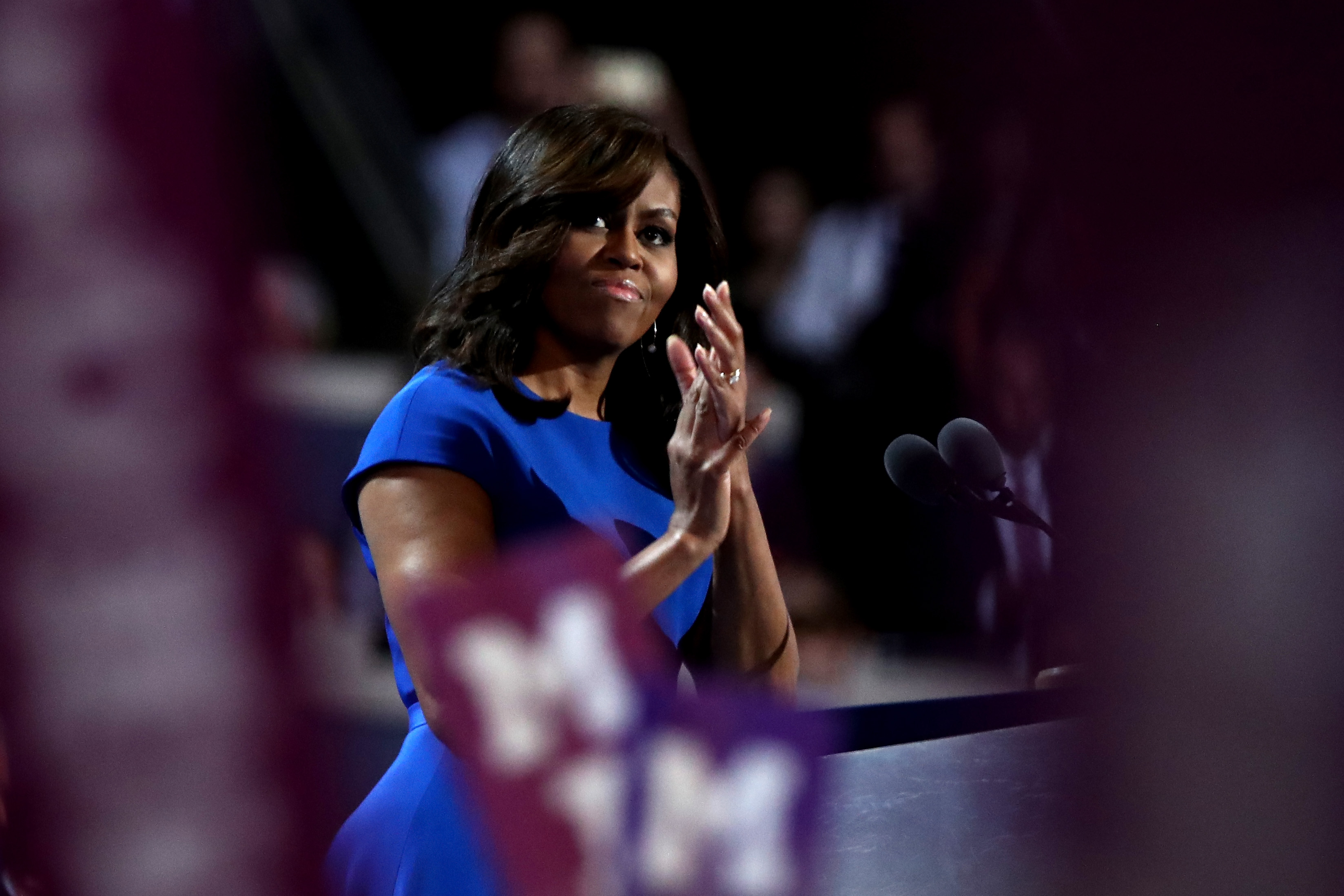 PHILADELPHIA, PA - JULY 25: First lady Michelle Obama acknowledges the crowd during her speech on the first day of the Democratic National Convention at the Wells Fargo Center, July 25, 2016 in Philadelphia, Pennsylvania. An estimated 50,000 people are expected in Philadelphia, including hundreds of protesters and members of the media. The four-day Democratic National Convention kicked off July 25. Jessica Kourkounis/Getty Images/AFP