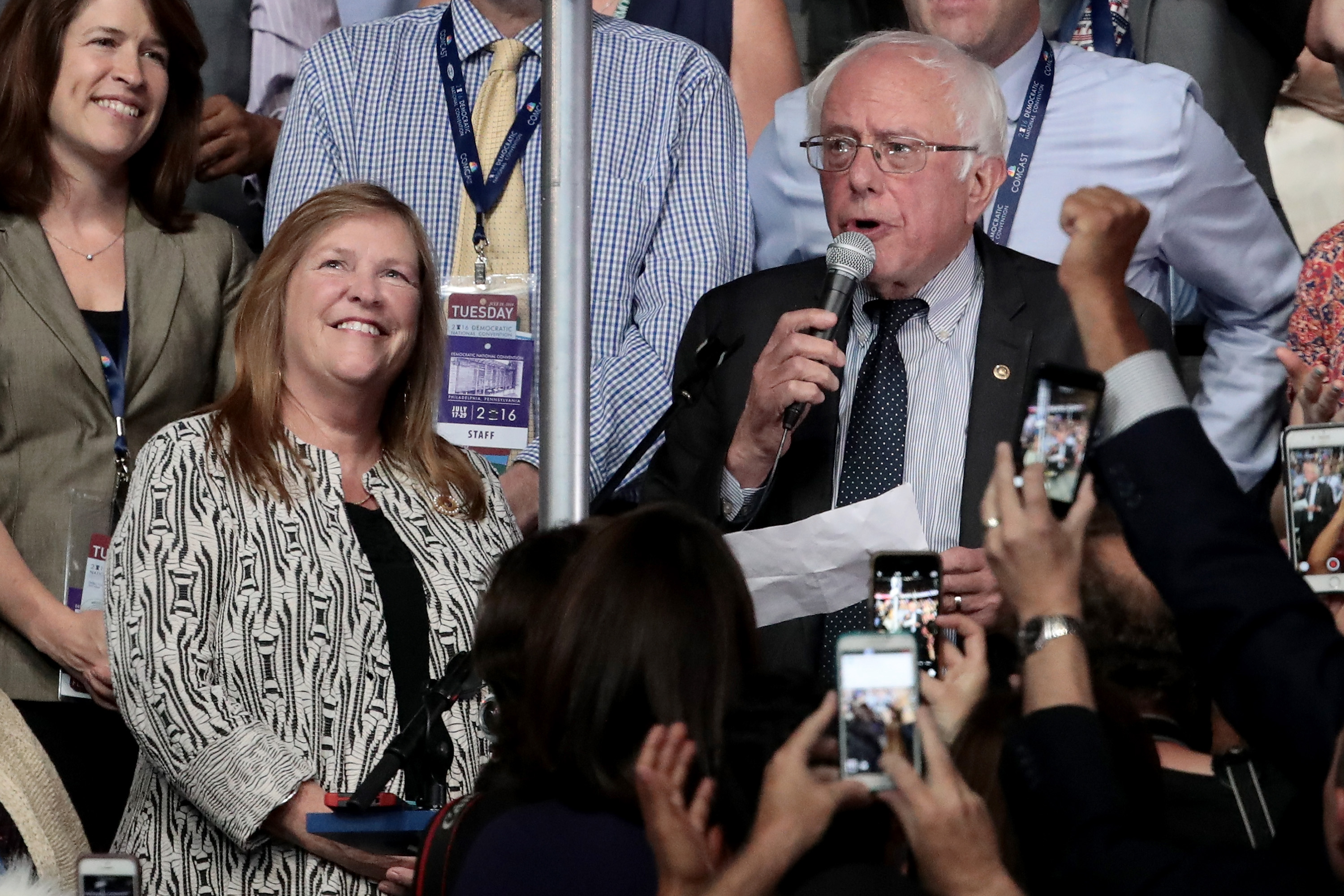 PHILADELPHIA, PA - JULY 26: Sen. Bernie Sanders (R) along with the Vermont delegation and his wife Jane O'Meara Sanders (L) cast their votes during roll call on the second day of the Democratic National Convention at the Wells Fargo Center, July 26, 2016 in Philadelphia, Pennsylvania. Democratic presidential candidate Hillary Clinton received the number of votes needed to secure the party's nomination. An estimated 50,000 people are expected in Philadelphia, including hundreds of protesters and members of the media. The four-day Democratic National Convention kicked off July 25.   Drew Angerer/Getty Images/AFP