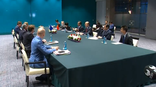 German and South Korean leaders arrive in Mongolia for ASEM summit as China's Foreign Minister discusses latest developments in overcapacity discussions with EU foreign policy chief. (Photo captured from Reuters video)