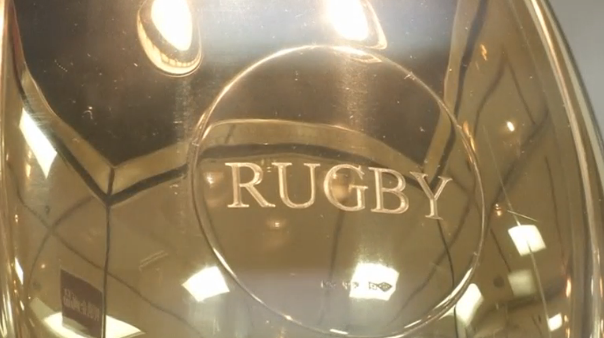 A 2.8 kilogram rugby ball made of pure gold goes on sale for the first time in Japan. (Photo captured from Reuters video)