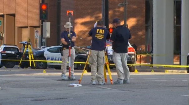 FBI forensic teams gather evidence in Dallas, following a sniper attack that killed five police officers during a protest decrying police shootings of black men. (Photo grabbed from Reuters video/Courtesy Reuters)
