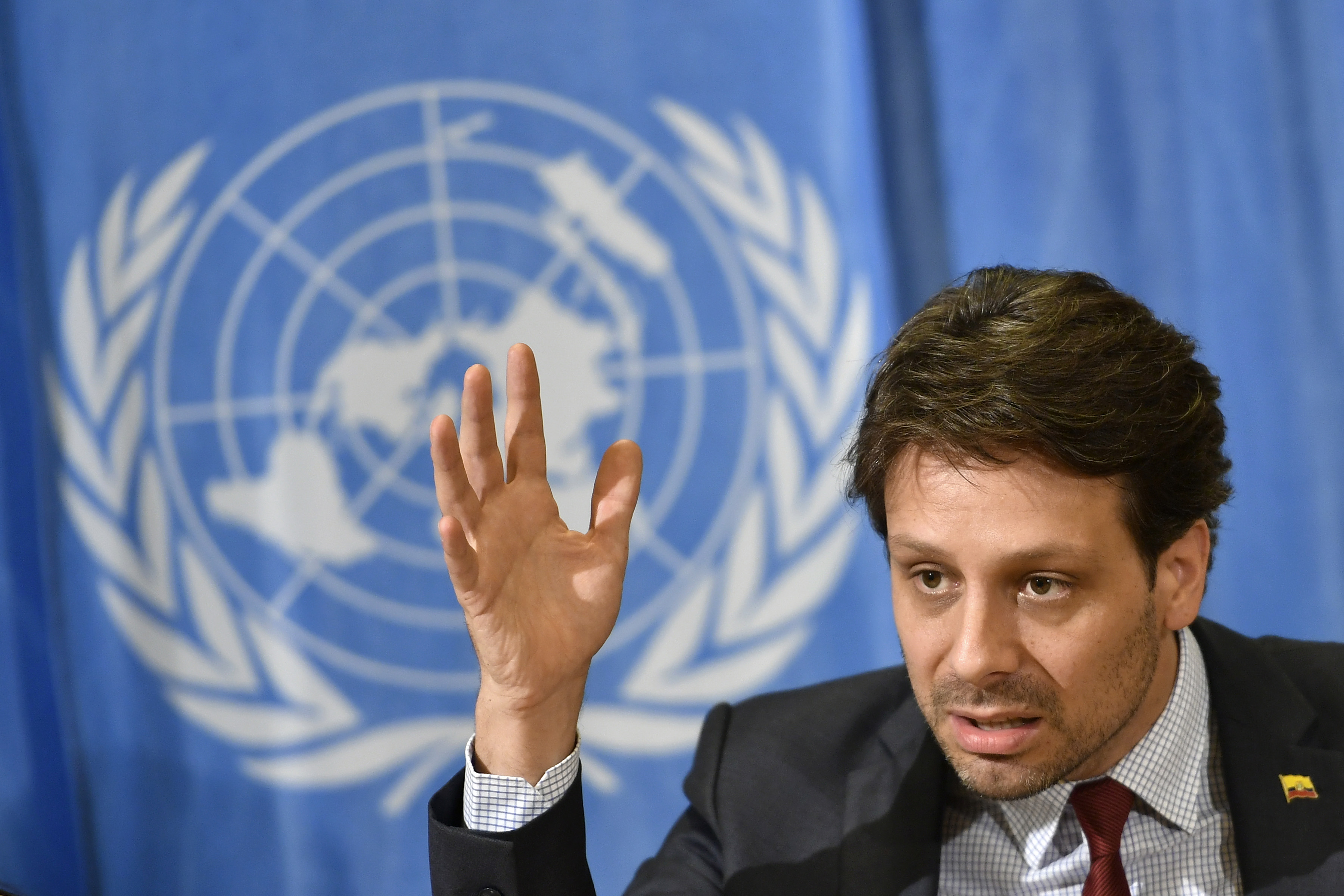 Ecuador's Minister of Foreign Affairs and Human Mobility Guillaume Long gestures during a press conference on WikiLeaks founder Julian Assange on June 29, 2016 at the United Nations offices in Geneva. Assange, 44, recently marked the start of his fifth year inside Ecuador's UK mission in a bid to avoid extradition. / AFP PHOTO / FABRICE COFFRINI