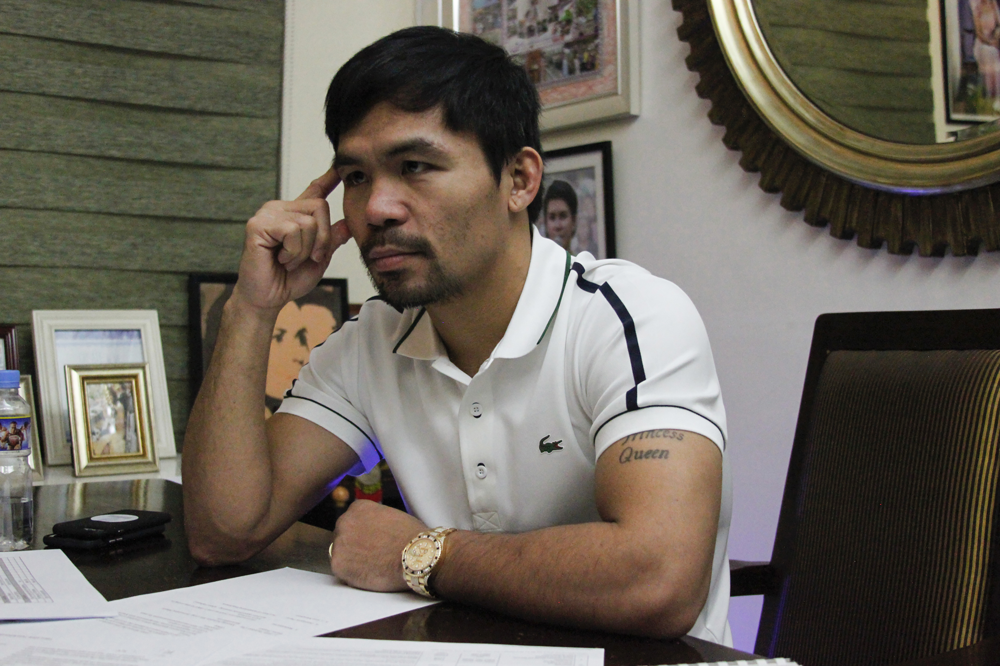In this picture taken on July 13, 2016, Philippine boxing icon Manny Pacquiao gestures during a media interview at his residence in General Santos City, on the southern island of Mindanao. Pacquiao has declared he still has the passion for the sport and may come out of retirement, although there are no plans for a fight this year. / AFP PHOTO / Aquiles ZONIO
