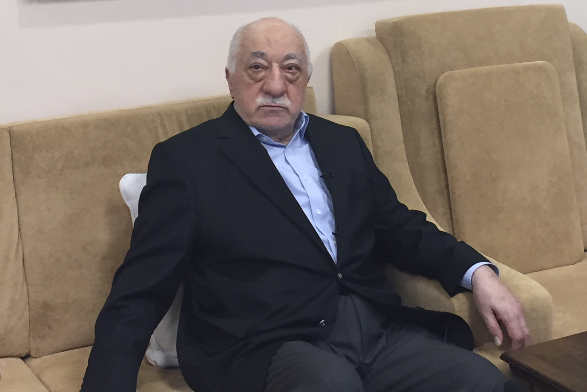 Turkish cleric and opponent to the Erdogan regime Fethullah Gülen adresses at his residence in Saylorsburg, Pennsylvania on July 18, 2016 allegations by the Turkish government about his involvement in the attempted July 15 coup. The US-based cleric was accused by Ankara of orchestrating Friday's military coup attempt but he firmly denied involvement, also condemning the action "in the strongest terms". / AFP PHOTO / Thomas URBAIN