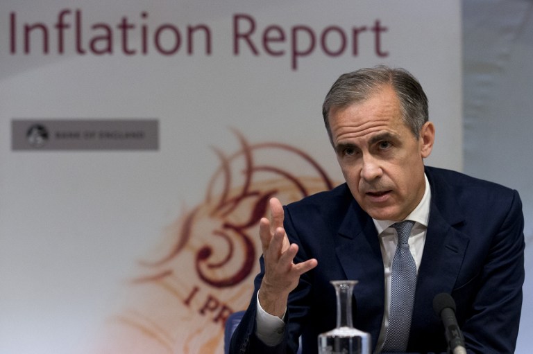 Governor of the Bank of England Mark Carney hosts his quarterly Inflation Report press conference at the Bank of England in central London, on August 4, 2016. The Bank of England on Thursday cut interest rates to a record low 0.25 percent in a vast stimulus package aimed at preventing recession after Brexit.  / AFP PHOTO / POOL / JUSTIN TALLIS