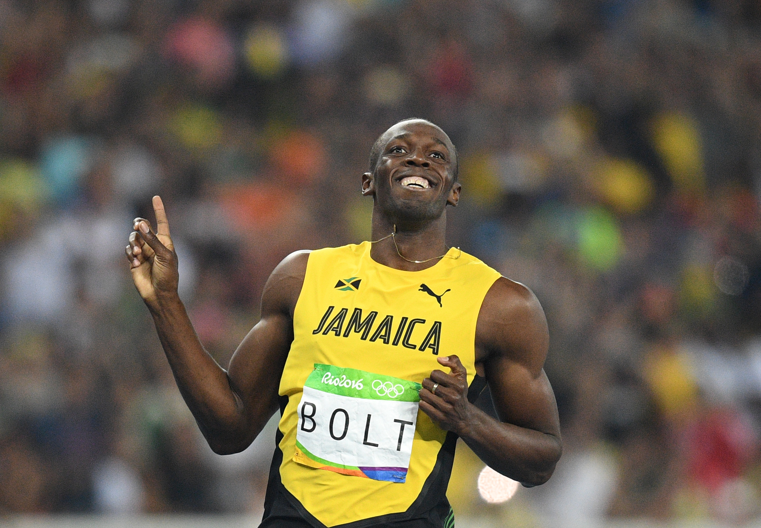 Jamaica's Usain Bolt reacts after winning his Men's 200m Semifinal during the athletics event at the Rio 2016 Olympic Games at the Olympic Stadium in Rio de Janeiro on August 17, 2016.   / AFP PHOTO / Johannes EISELE