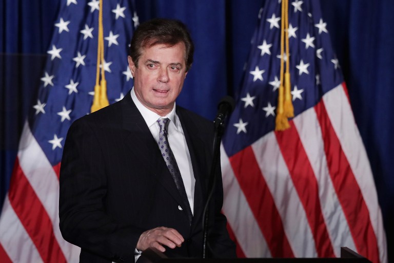 (FILES) This file photo taken on April 26, 2016 shows  Paul Manafort, advisor to Republican presidential candidate Donald Trump's campaign, checking the teleprompters before Trump's speech at the Mayflower Hotel in Washington, DC. Paul Manafort, the embattled chairman of Donald Trump's presidential campaign who has been under fire in connection with a Ukrainian corruption investigation, tendered his resignation on August 19, 2016. "This morning, Paul Manafort offered, and I accepted, his resignation from the campaign," the Republican nominee said in a statement. "I am very appreciative for his great work in helping to get us where we are today," he added.  / AFP PHOTO / GETTY IMAGES NORTH AMERICA / CHIP SOMODEVILLA