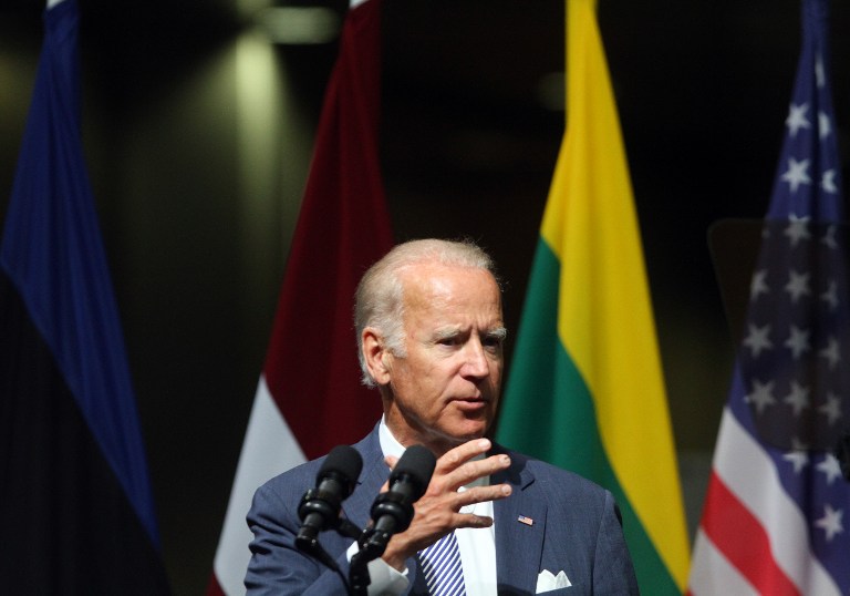 US Vice President Joe Biden holds a speech at the Latvian National Library in Riga on August 23, 2016. US Vice President Joe Biden holds talks with presidents of Estonia, Latvia, Lithuania amid tensions with Russia which has upped military activity in the Baltic region since its 2014 annexation of Crimea. / AFP PHOTO / Petras Malukas