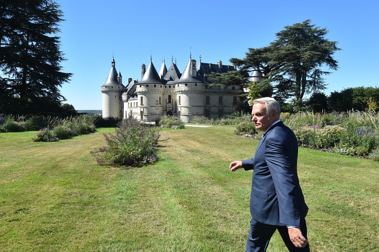 French Foreign Affairs Minister Jean-Marc Ayrault visits the garden of Chaumont Castle, on August 23, 2016, in Chaumont-sur-Loire, central France.  The number of tourists visiting France has dropped seven percent since January, with foreigners deterred by terror attacks but also by bad weather and transport strikes, Ayrault said. / AFP PHOTO / JEAN-FRANCOIS MONIER