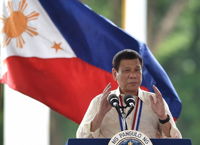 Philippine President Rodrigo Duterte delivers an address at the National Heroes' Cemetery as part of commemorations for National Heroes' Day in Manila on August 29, 2016.   / AFP PHOTO / TED ALJIBE