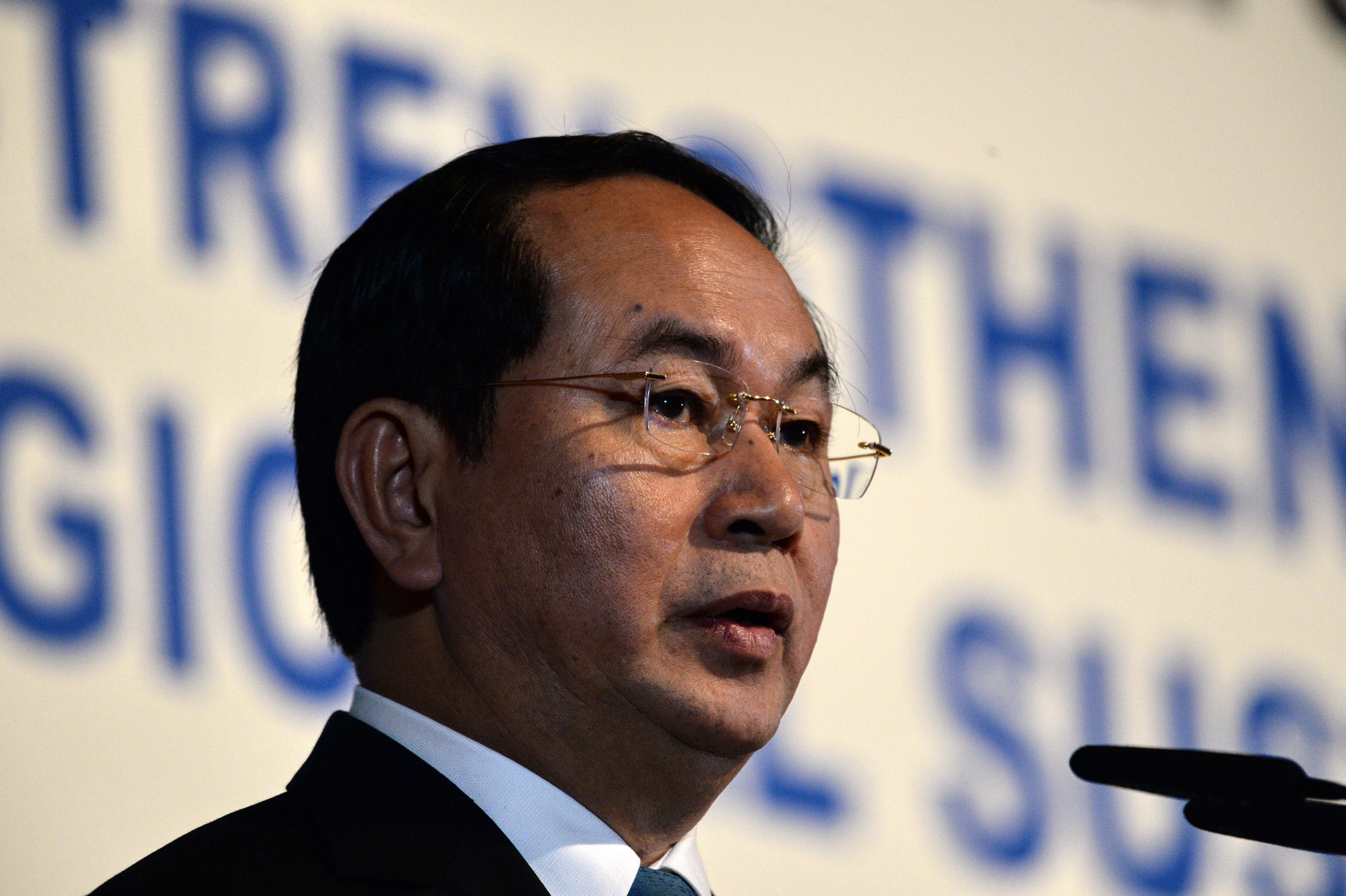 Vietnamese President, Tran Dai Quang delivers a speech at the 38th Singapore Lecture, organised by the Institute of Southeast Asian Studies (ISEAS) in Singapore on August 30, 2016. President Tran Dai Quang is on a three day state visit at the invitation of Singapore president Tony Tan Keng Yam. / AFP PHOTO / ROSLAN RAHMAN